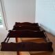Turned wooden wall shelf