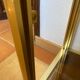 Regency style console table, in gilded metal and smoked glass