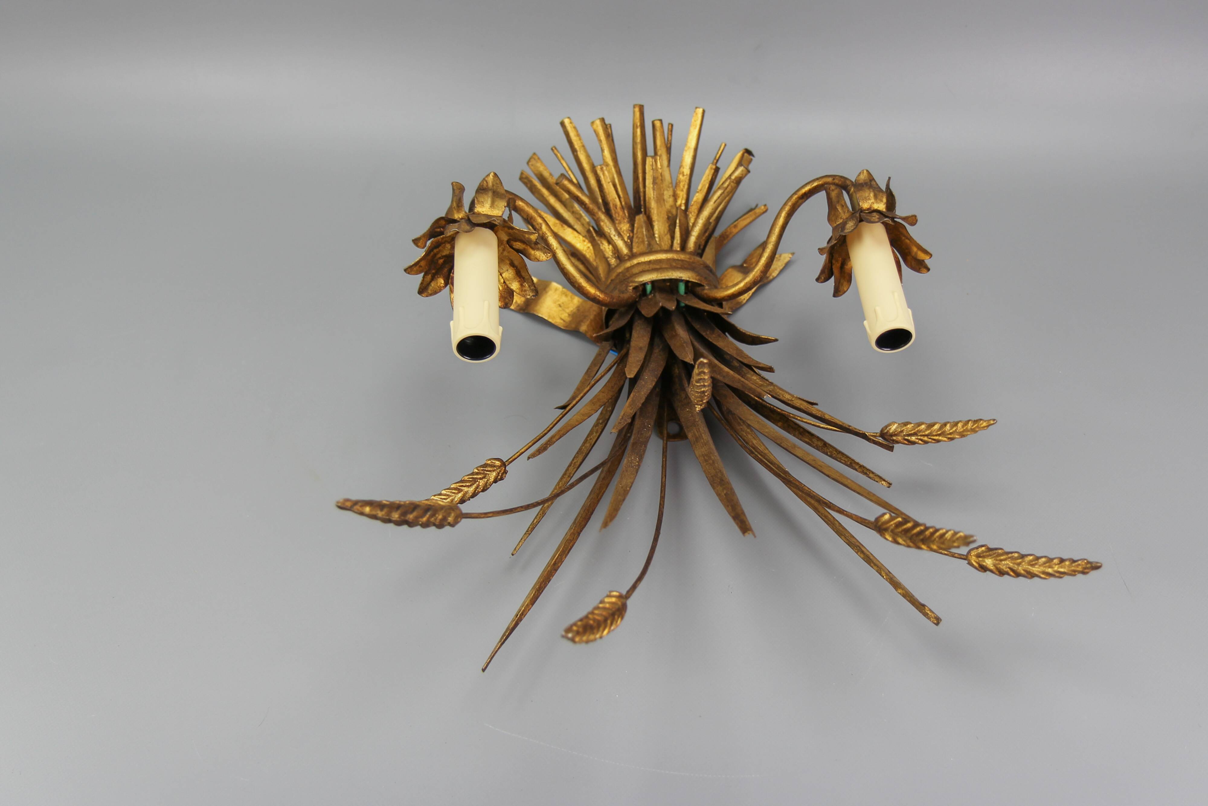 Gilt metal wheat sheaf two-light wall sconce