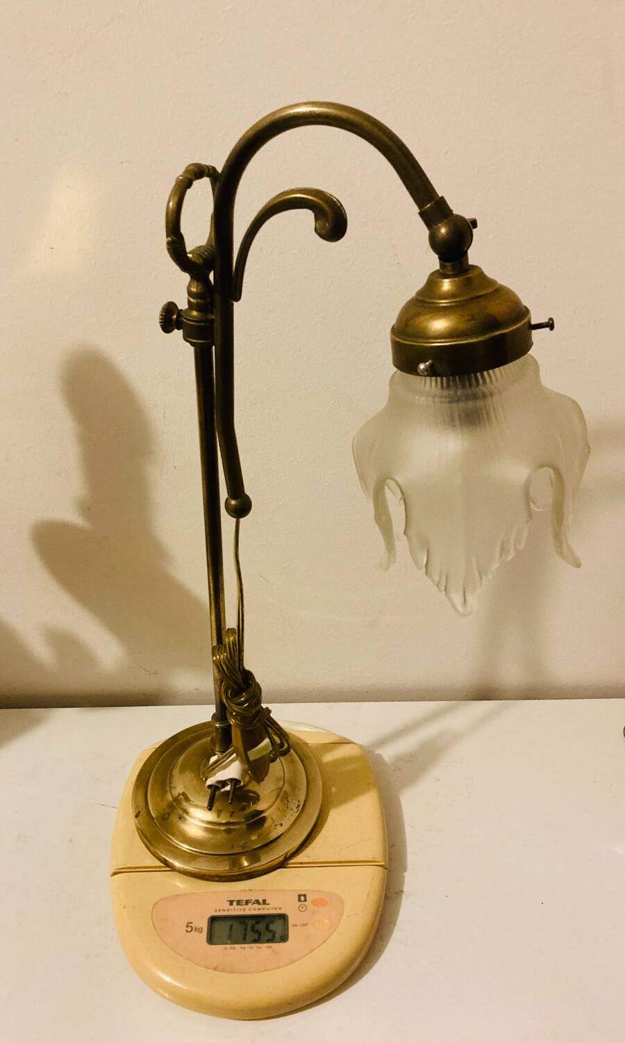 Brass table lamp with a glass shade