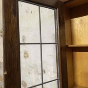 Oak display secretary cabinet with drop-down front, two sections.