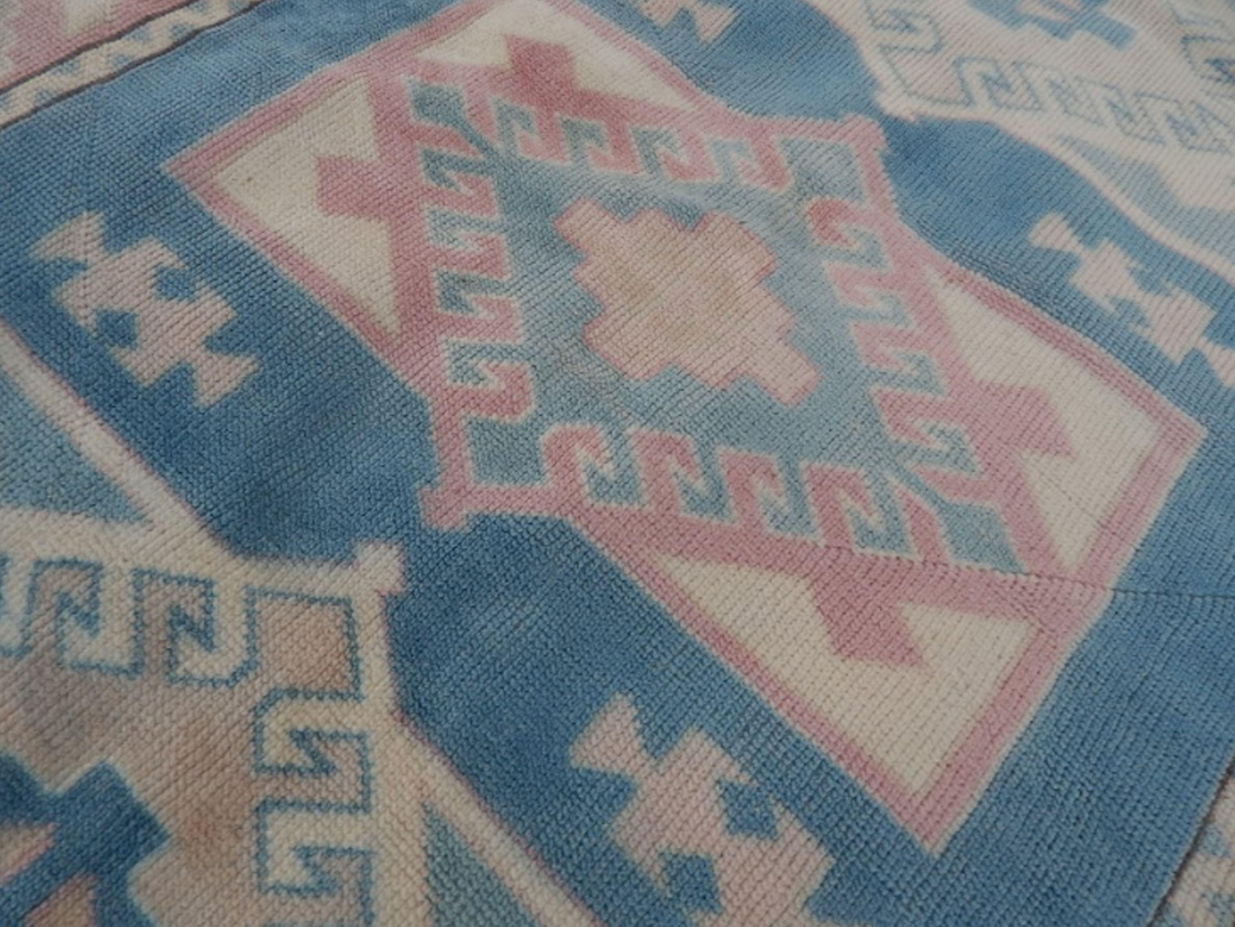Turkish kars rug with rich border - 4′2″ × 6′2″ (128 x 188 cm)