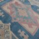 Turkish kars rug with rich border - 4′2″ × 6′2″ (128 x 188 cm)