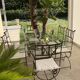 Table de terrasse plateau en verre + 6 chaises en fer forgé