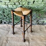 High stool in turned wood
