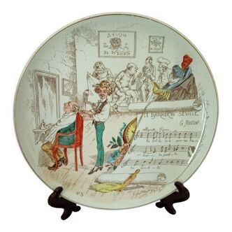 Assiette pour collection en faïence (  sujet Musicaux Le Barbier de Séville )