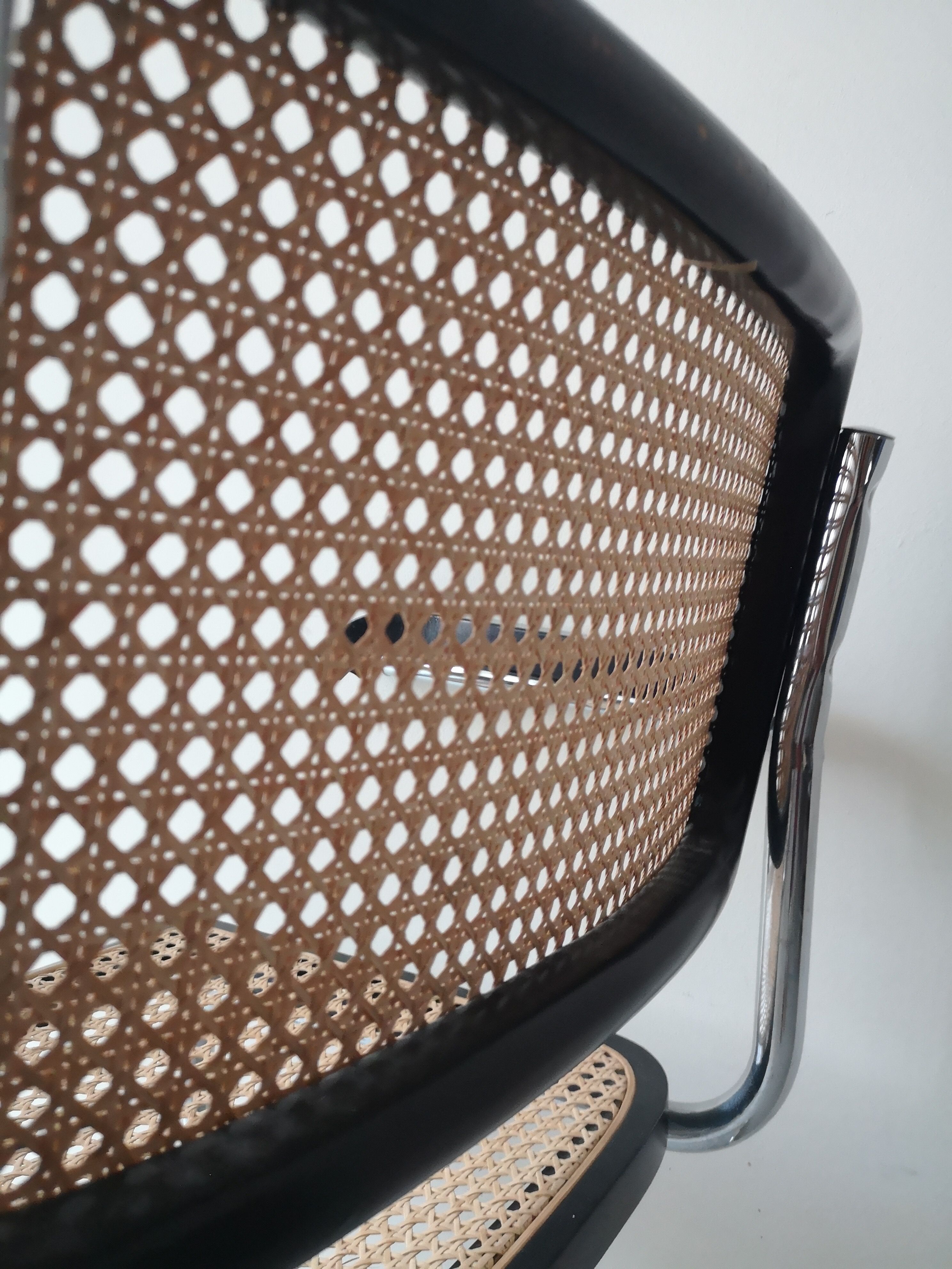 Cesca armchair with metal and wood armrest by Marcel Breuer
