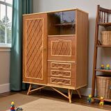 Rattan wardrobe with tapered legs from the 1960s.