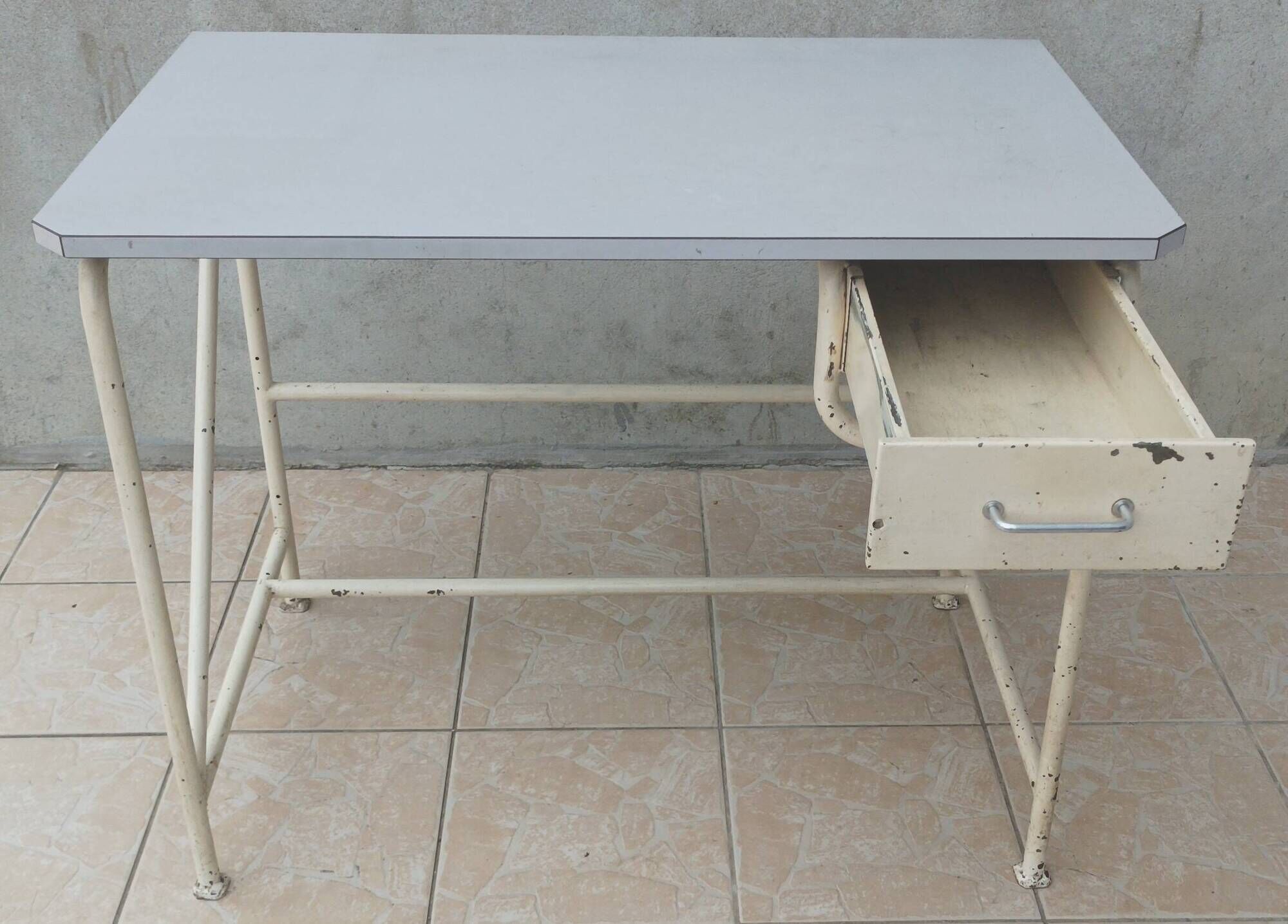 Industrial high table made of metal and formica.