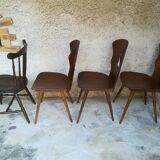 Eight mismatched bistro chairs