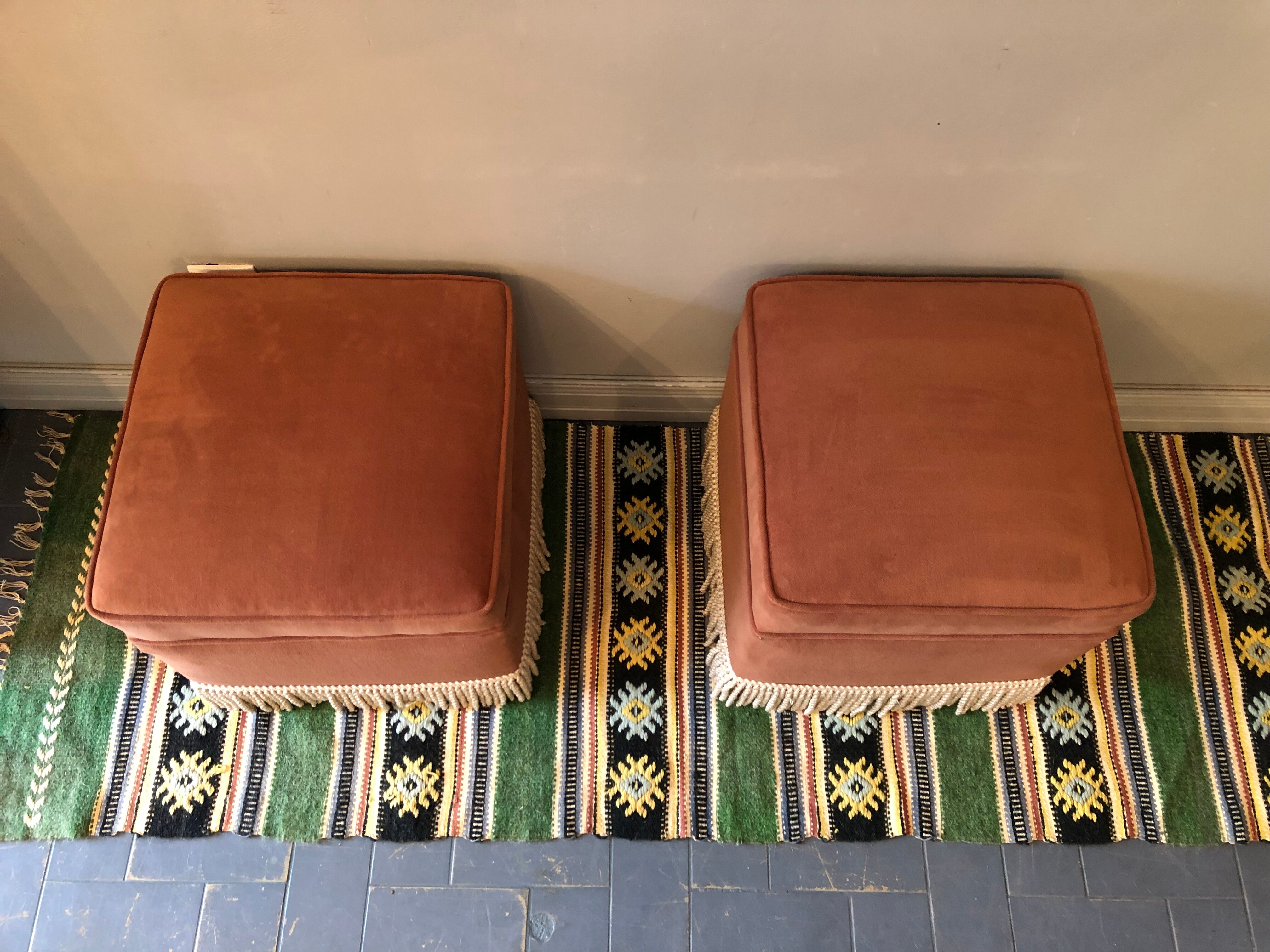 Duo of old pink poufs with fringes