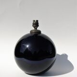 Old lamp foot shaped ball in black glass