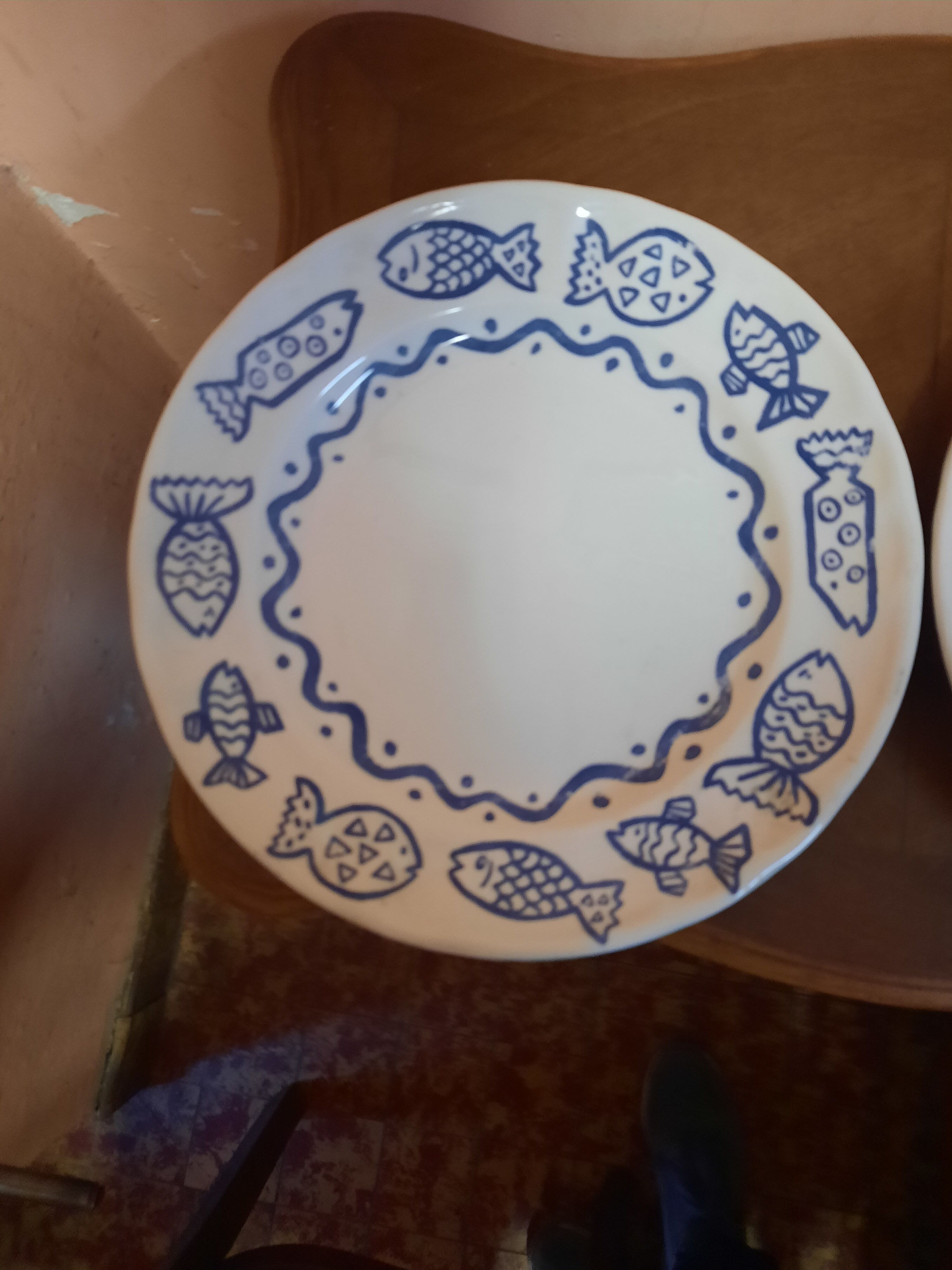 Duo of plates decorated fish