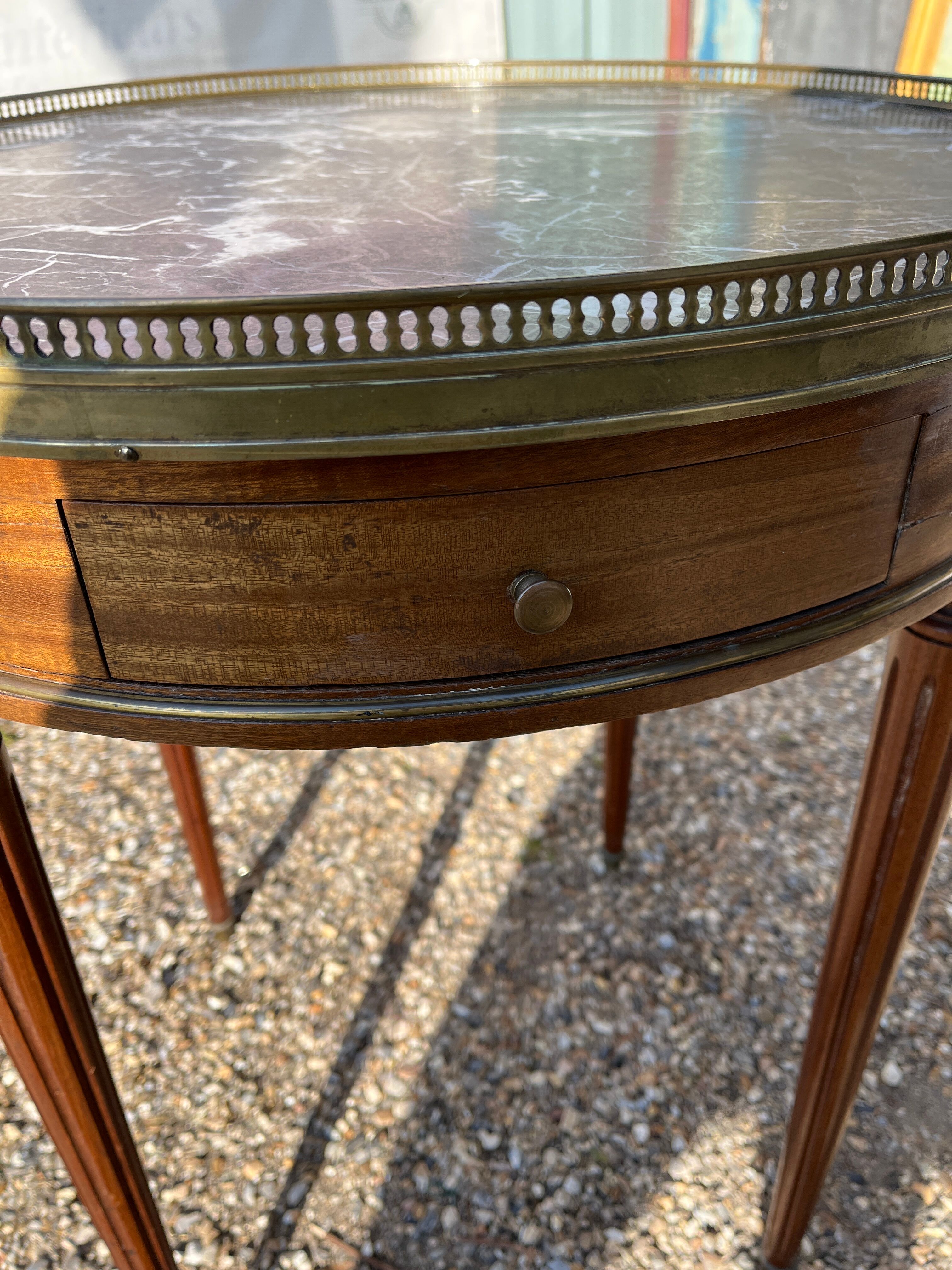 Mahogany hot water bottle table with brass net
