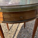 Mahogany hot water bottle table with brass net