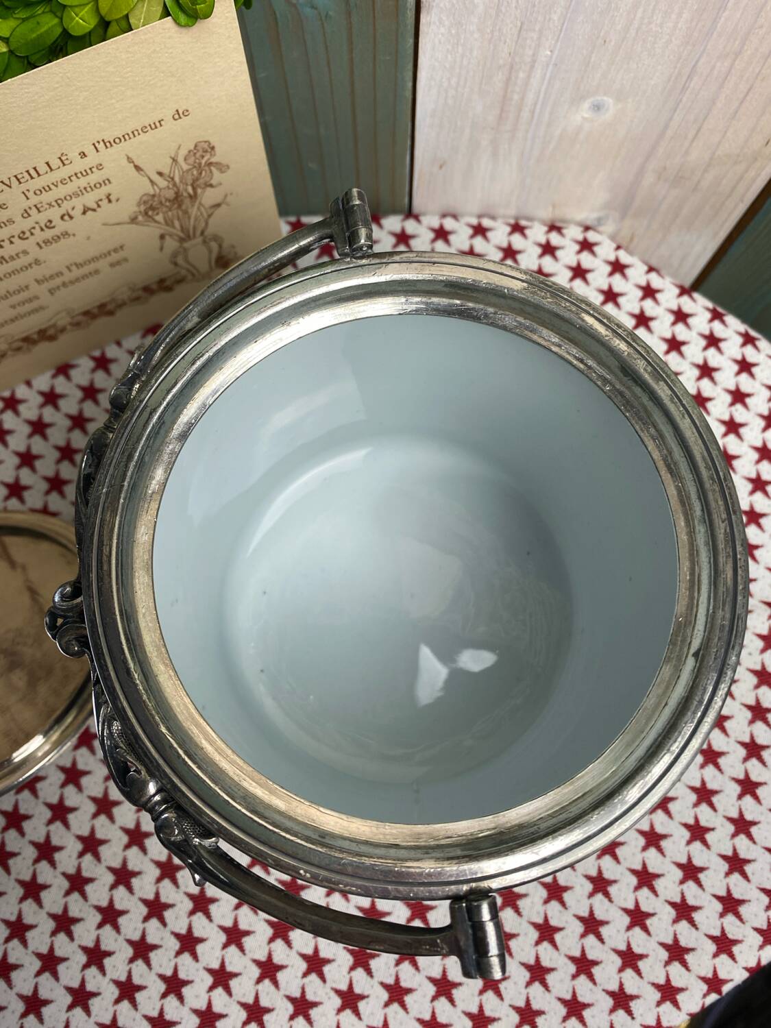 English porcelain and silver-plated metal cake tin