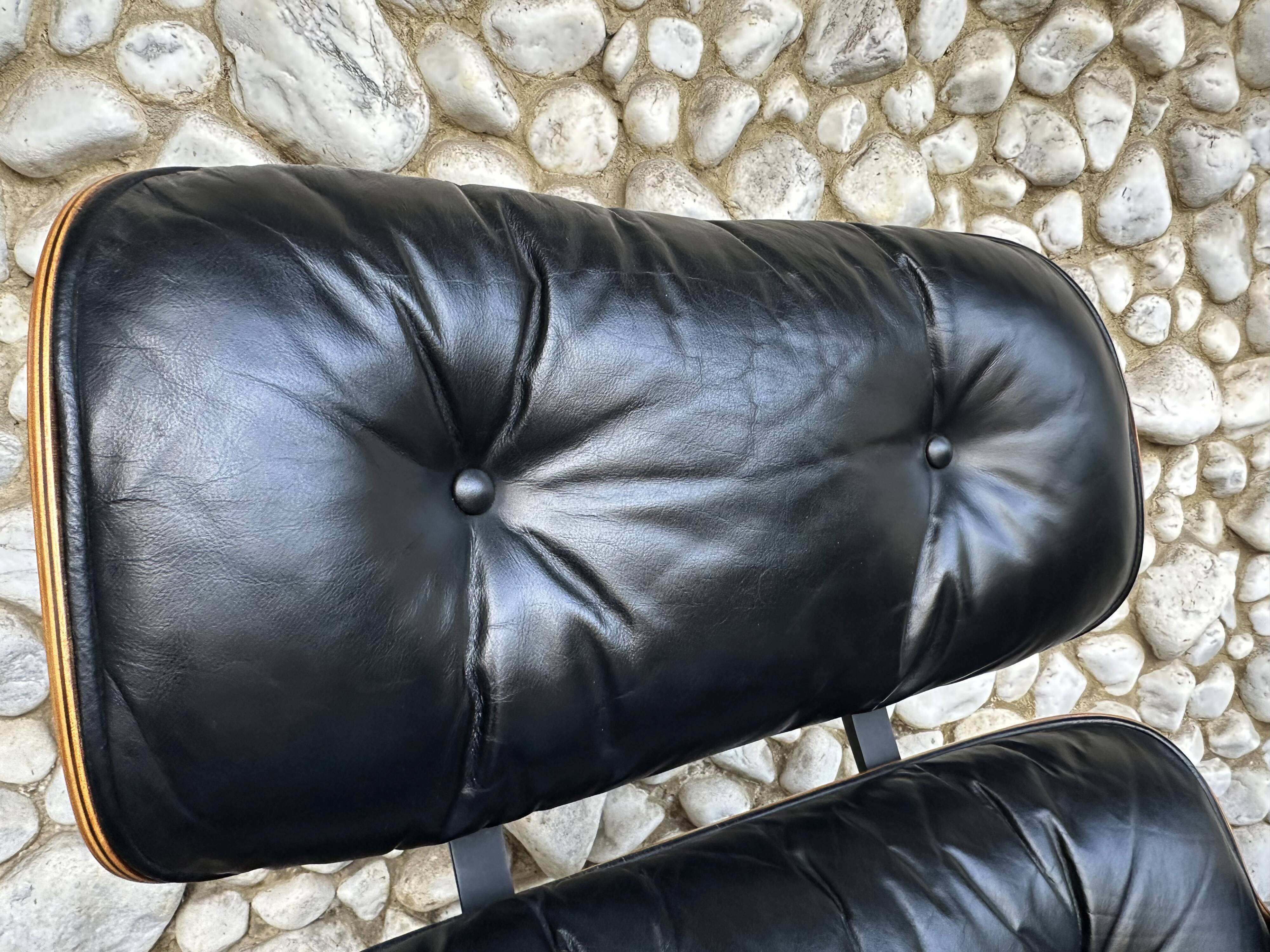 Fauteuil Lounge et ottoman Herman Miller Charles & Ray Eames, palissandre