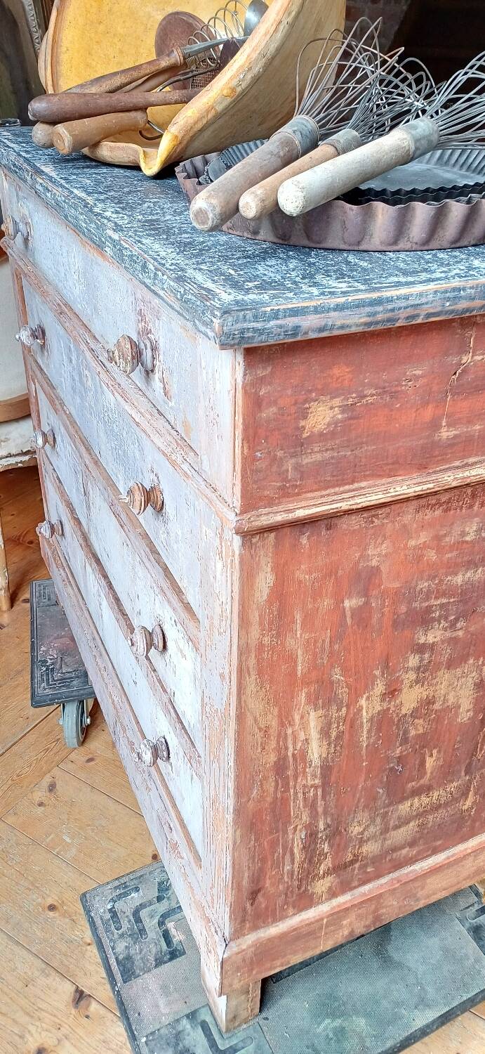 Antique piece of furniture with a grey patina.