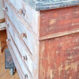 Antique piece of furniture with a grey patina.