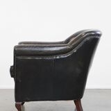 Black grained cowhide leather armchair