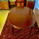 Louis XVI style mahogany oval or round table with extensions, 8 people