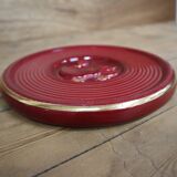 Vintage burgundy duck trivet with gold edging
