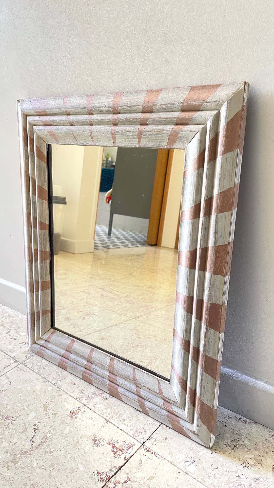 Old mirror in hand-painted wood