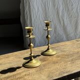 Pair of gilded candlesticks with engraved flower garland motifs H22
