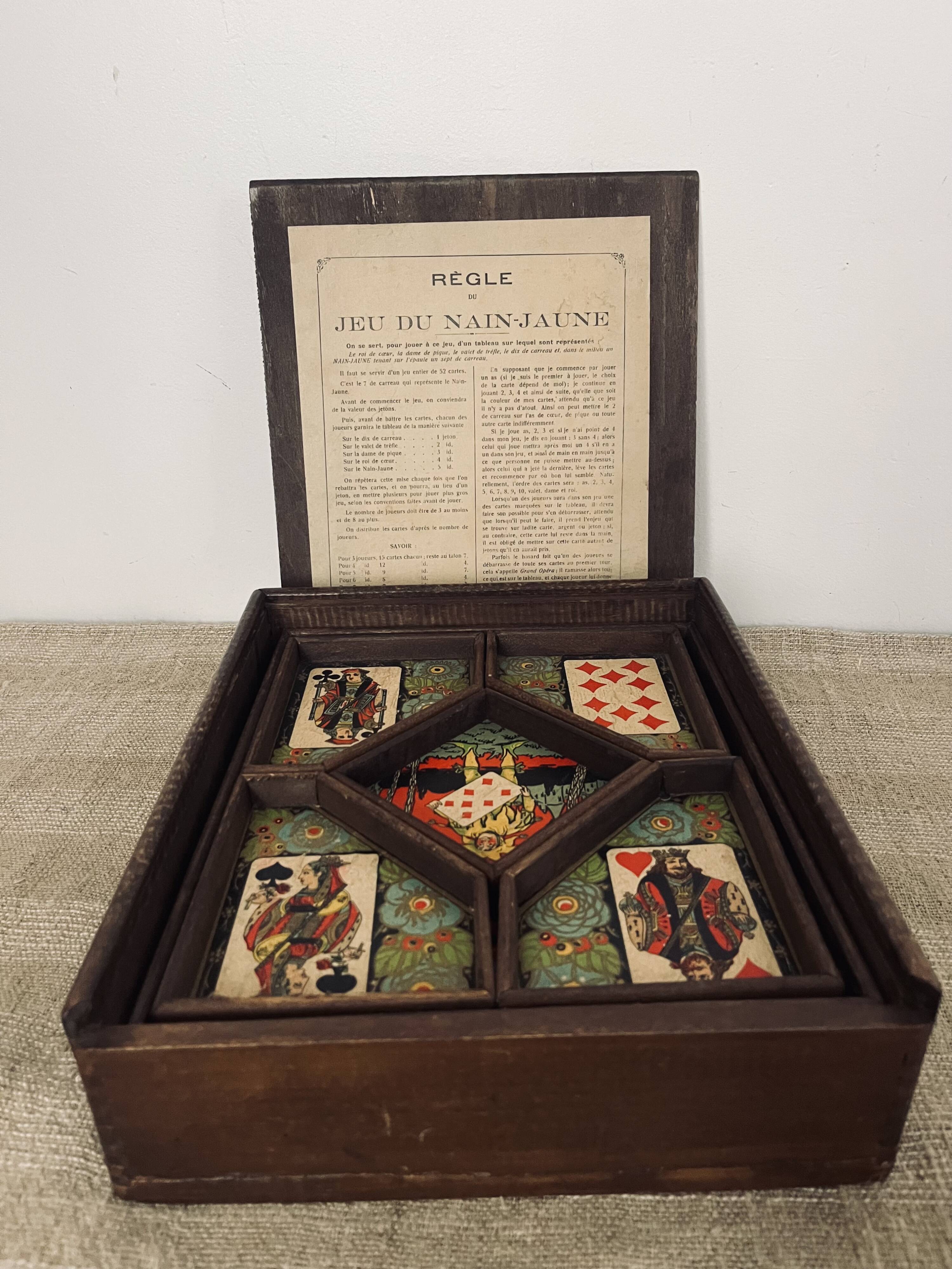 Old game of nain jaune with its bone tokens.