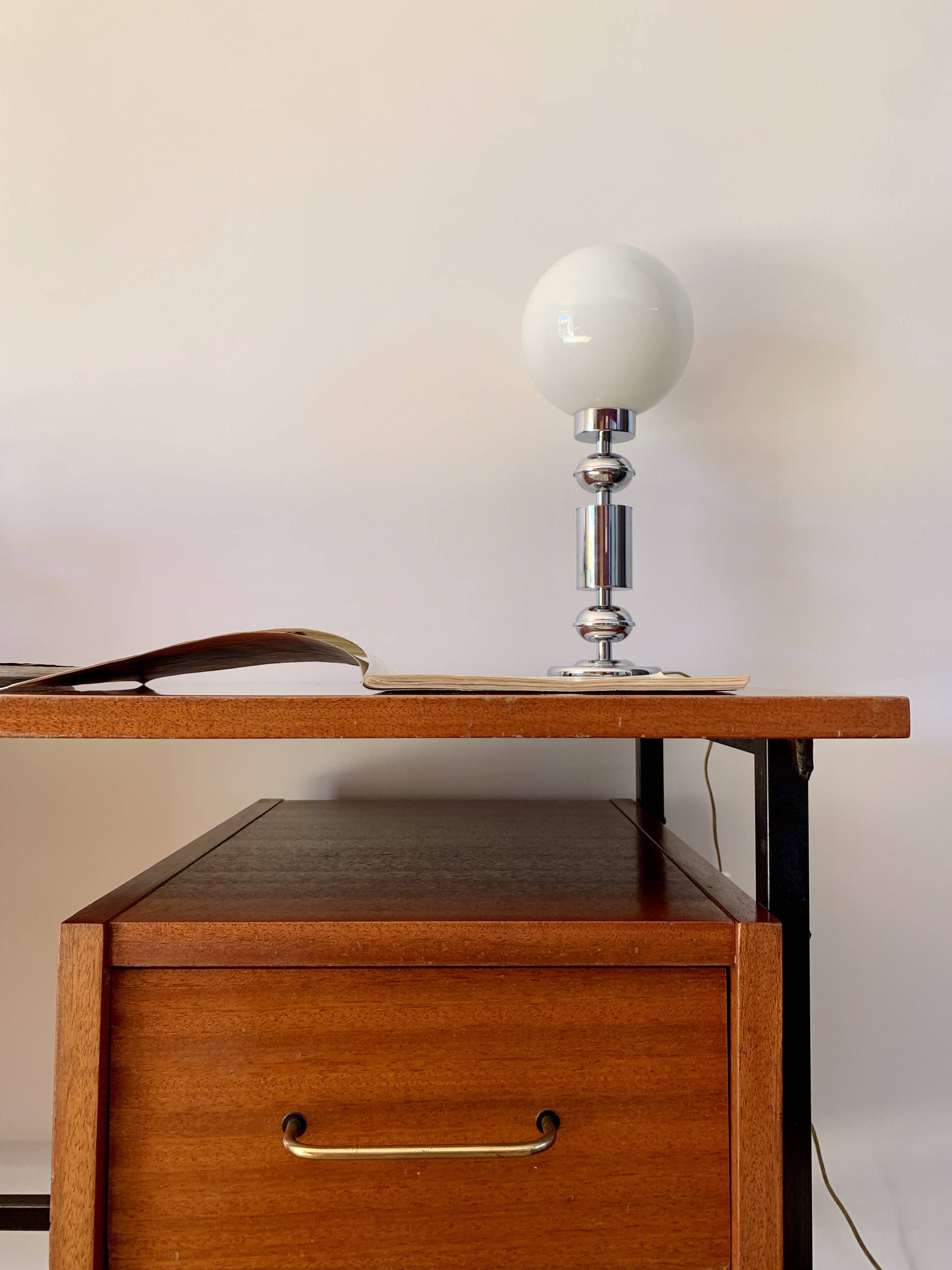lacquered wood desk and black steel legs design from the 60s and 70s