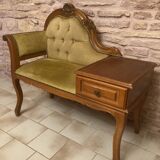 Telephone cabinet with seat