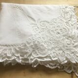 Embroidered white tablecloth and lace
