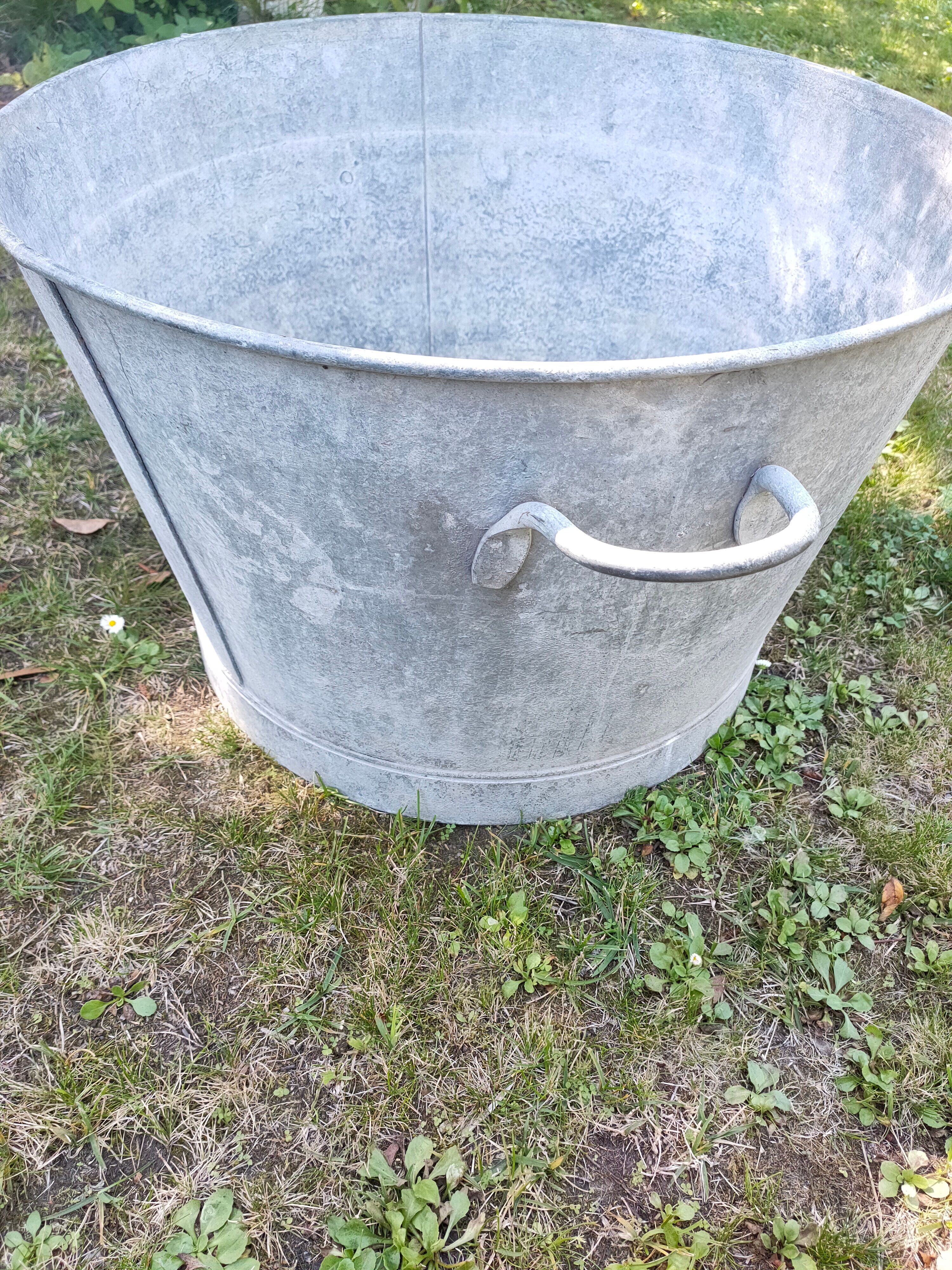 Old round zinc basin