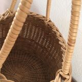 Round basket Wicker braided with two handles.