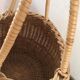 Round basket Wicker braided with two handles.