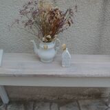 Console au piètement patiné gris coton, plateau en noyer blanchi.