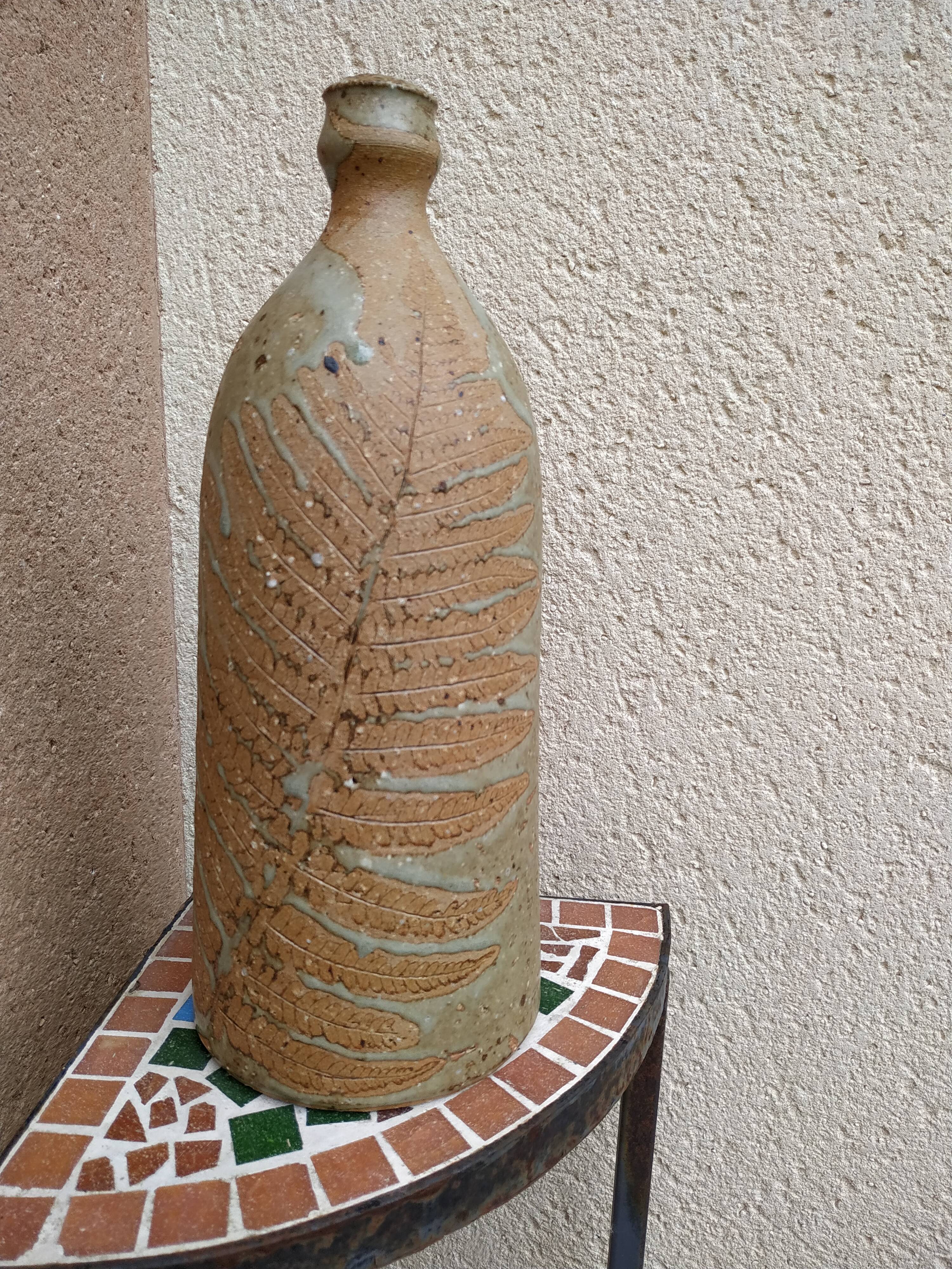 Sandstone bottle with inlaid fern décor by Alain Bernard Breton potter