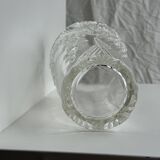 Glass vase with stylized flower pattern