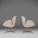Set of two leather Swan chairs by Arne Jacobsen for Fritz Hansen