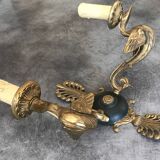 Antique bronze wall light with arm decorated with swans and palmettes in the Empire style