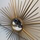 Golden metal witch's eye sun mirror from the 70s, 86cm.
