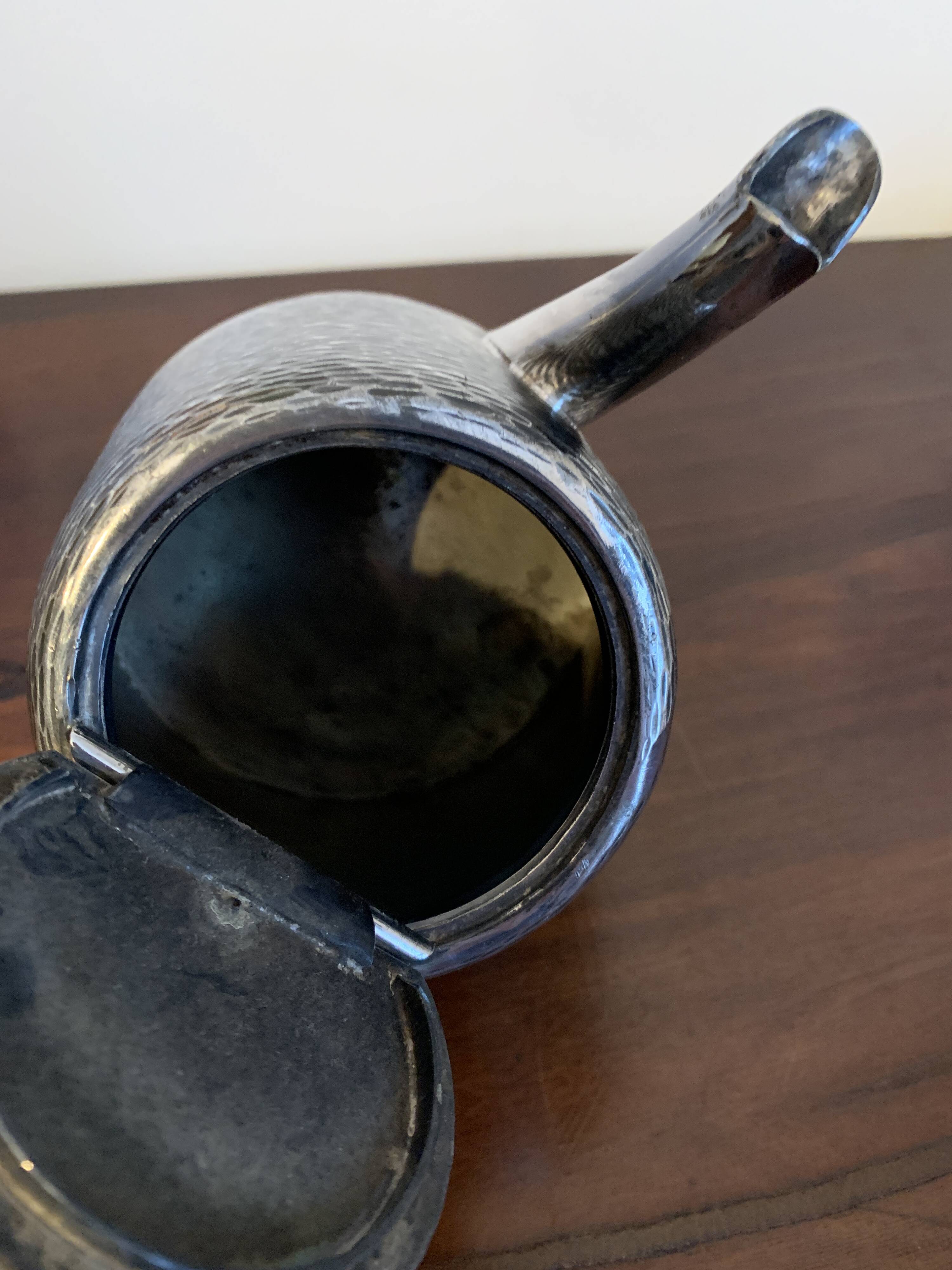 Théière en métal argenté
