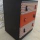 Three-drawer wooden and faux leather chest of drawers on wheels, completely refurbished.