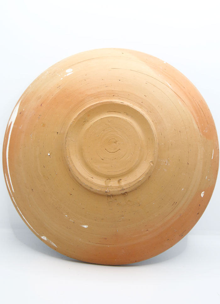 Traditional Romanian plate with psychedelic motifs from Horezu