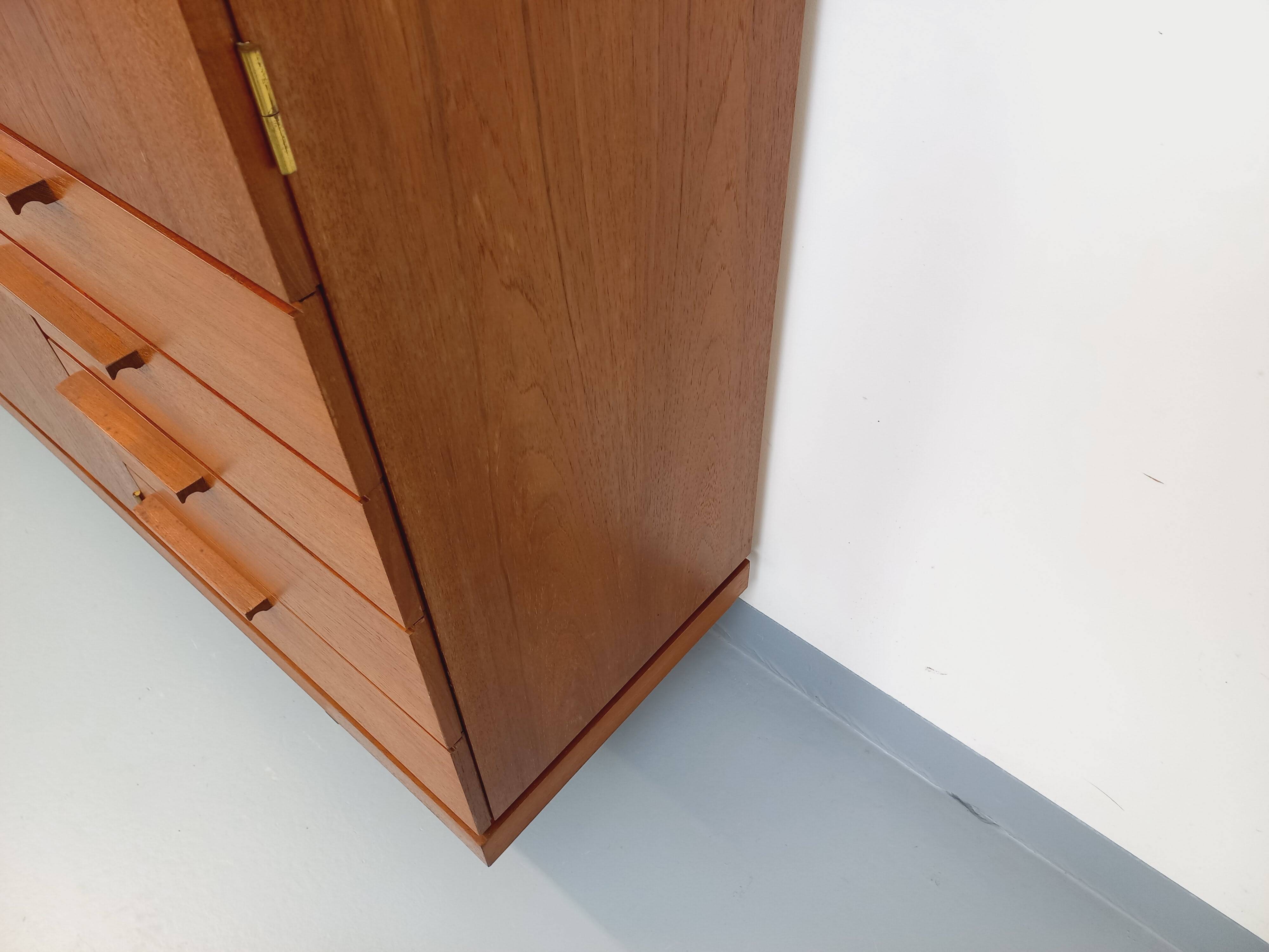 High Scandinavian modernist vintage sideboard in teak and black metal.
