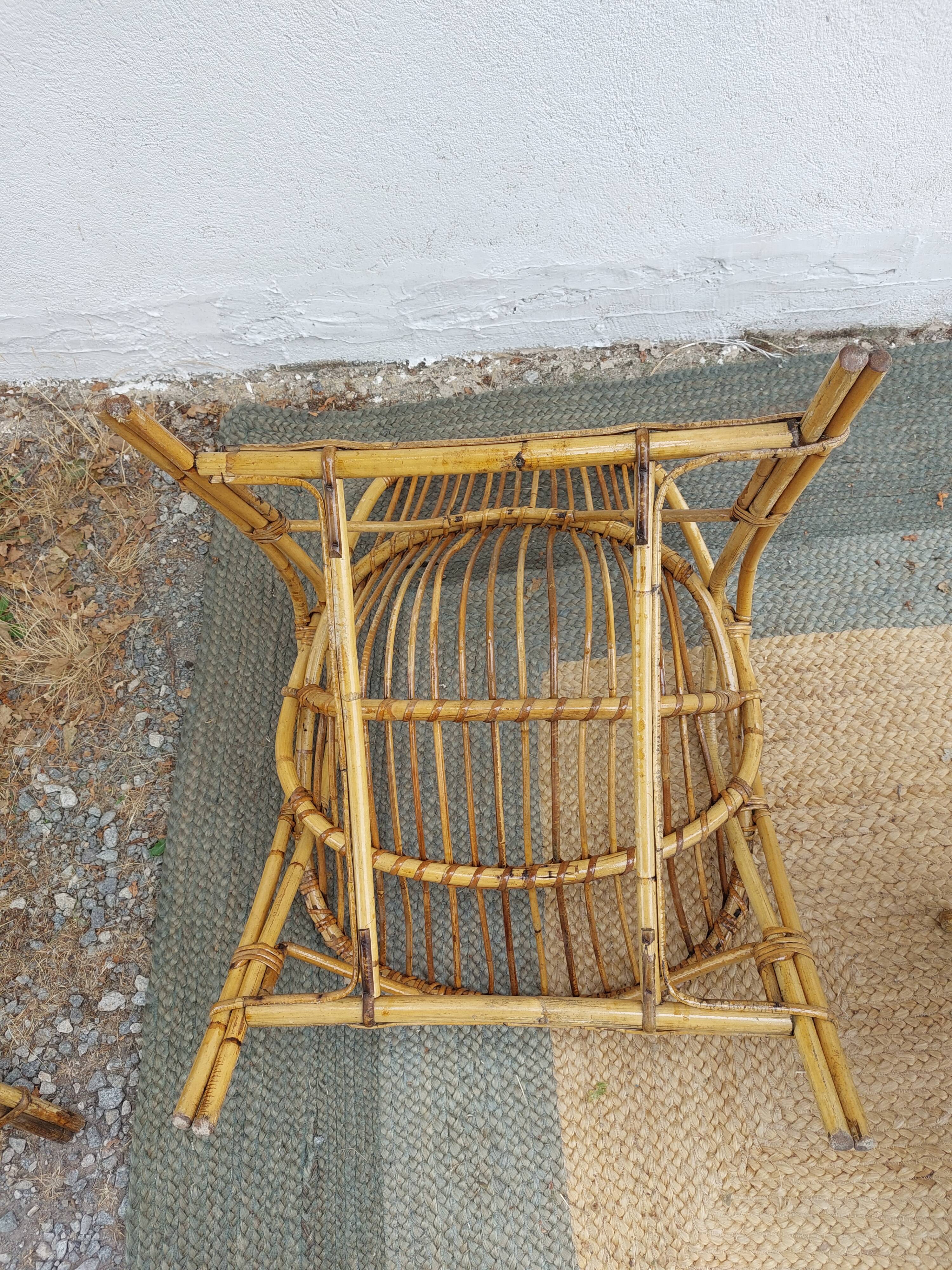 4 armchairs and a coffee table made of rattan and bamboo wood, vintage.