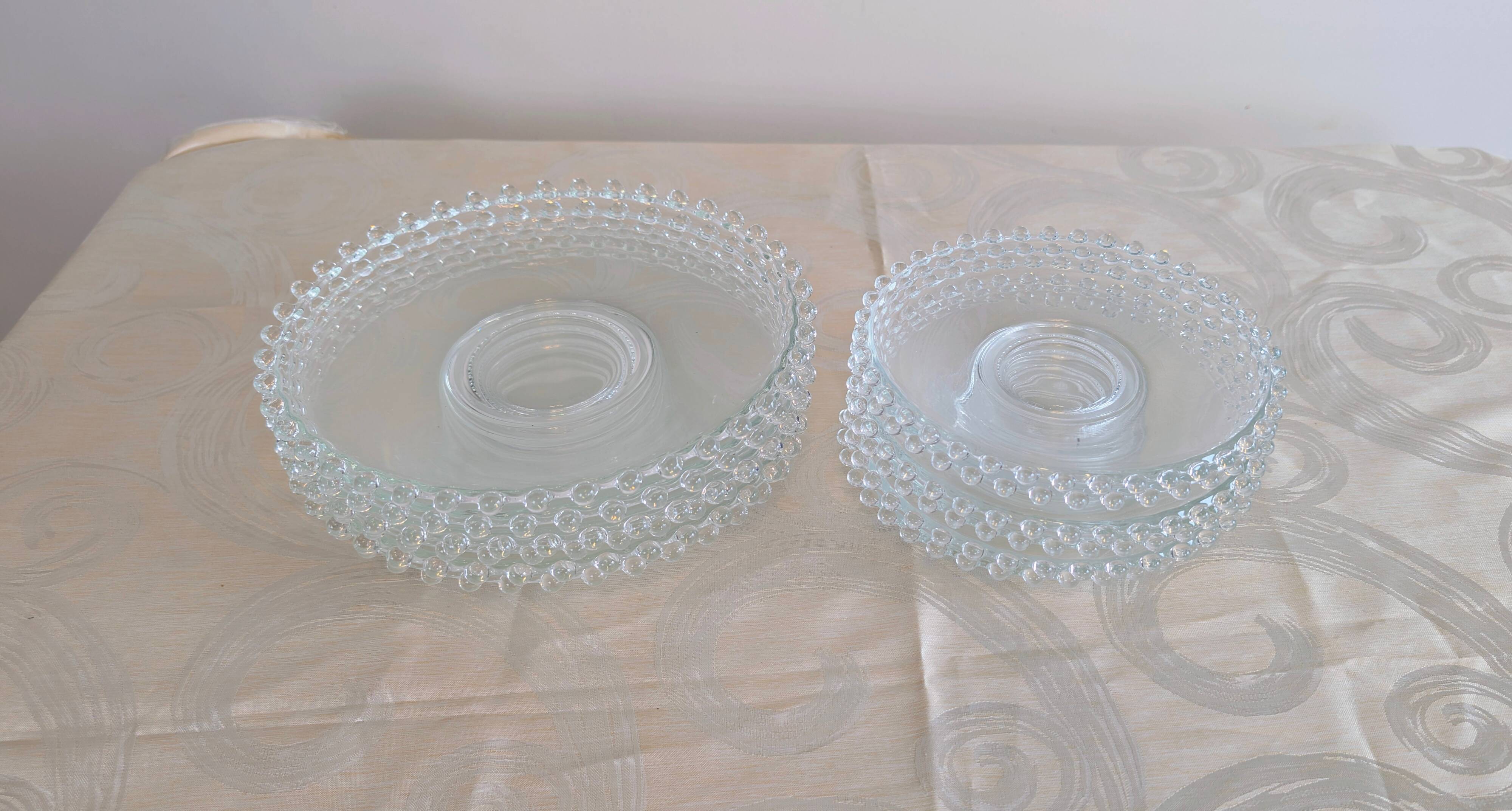 Vintage service of 12 pressed glass plates with bead decoration.