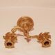 Old candle holder in gilded bronze