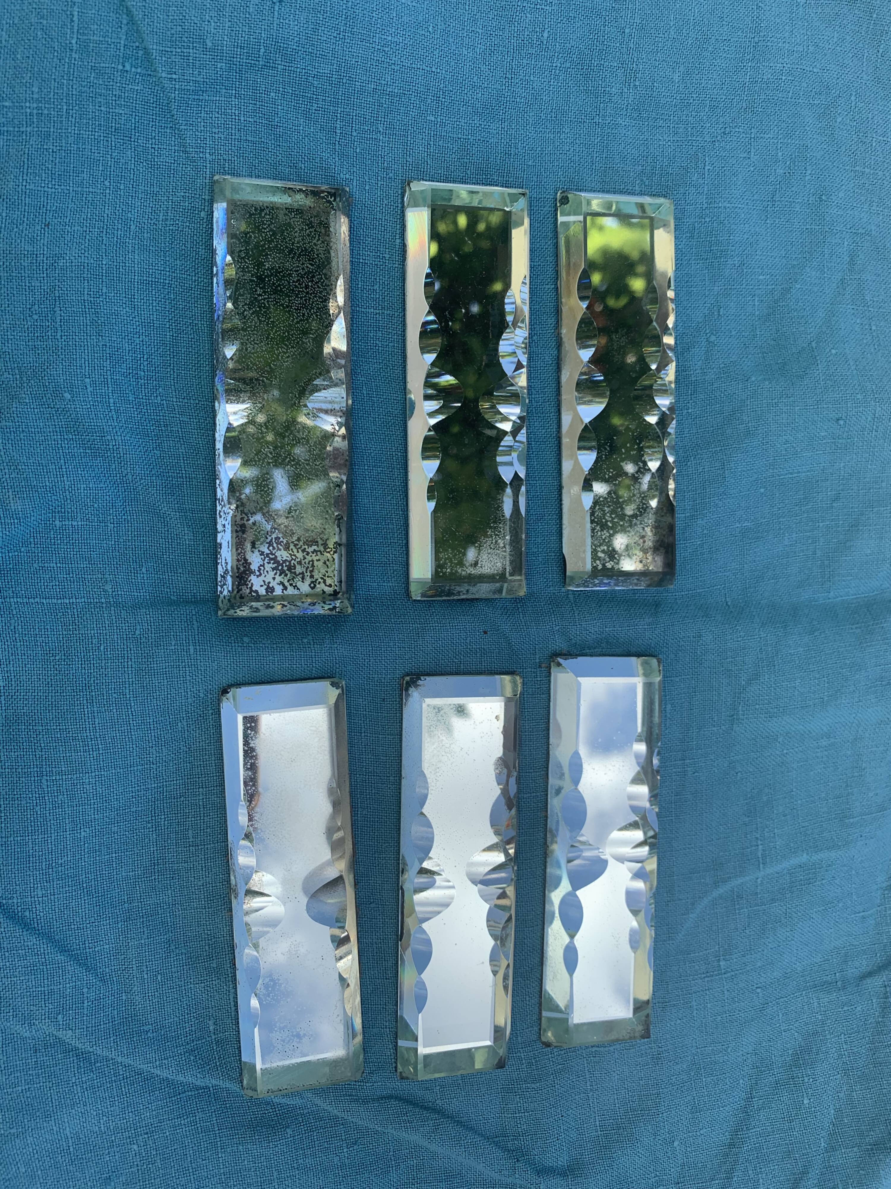 6 knife holders and a bottle bottom, glass, beveled mirror