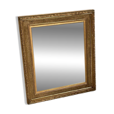 Small wooden mirror with gilded stucco in the Louis XVI style.